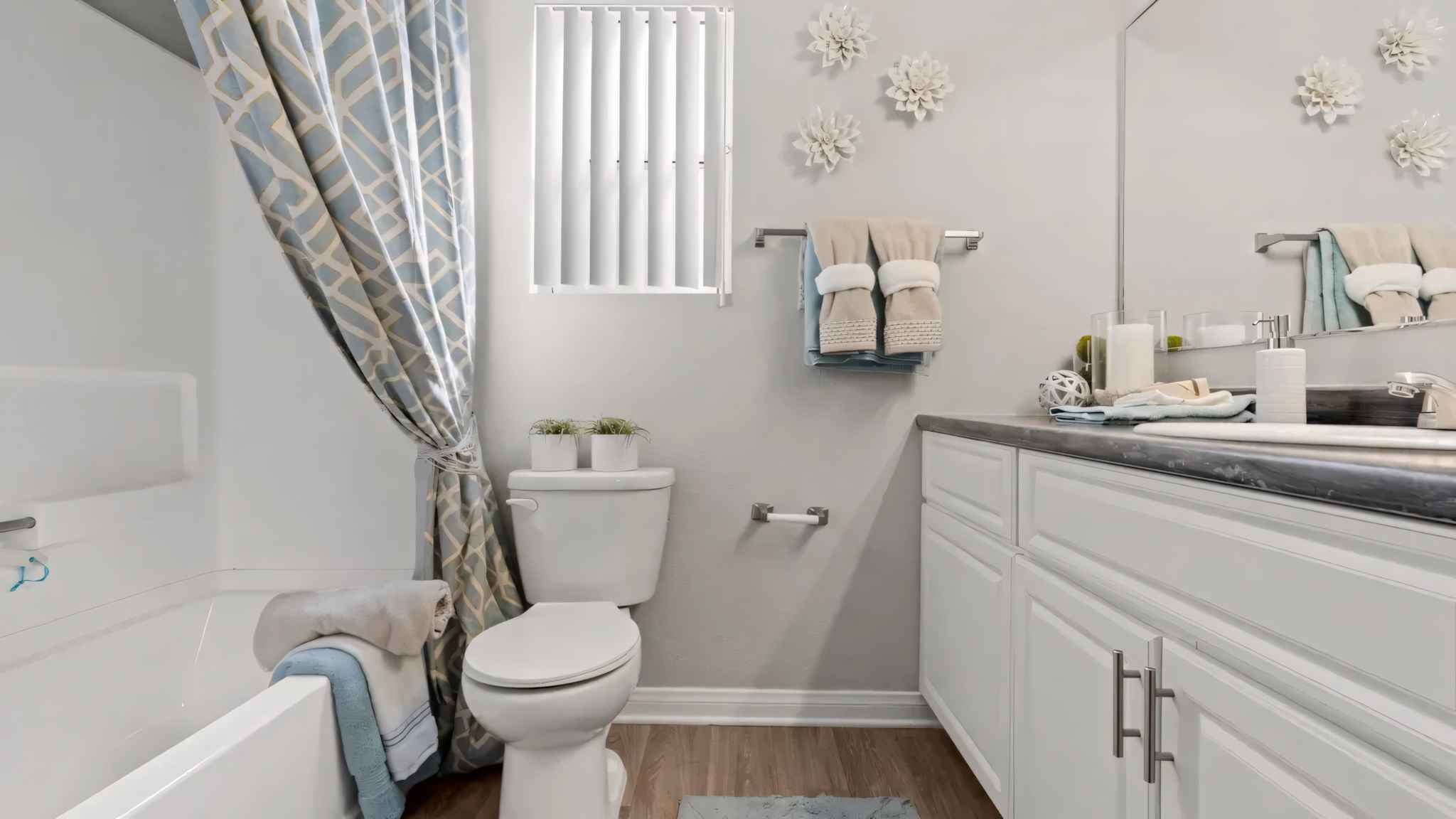 bathroom shower tub toilet sink at Millennium East