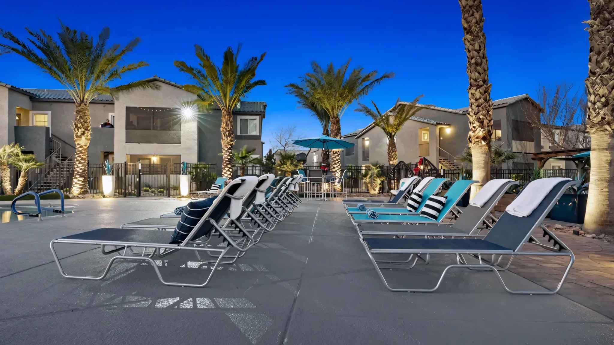 evening view of rows of pool loungers at Millennium East