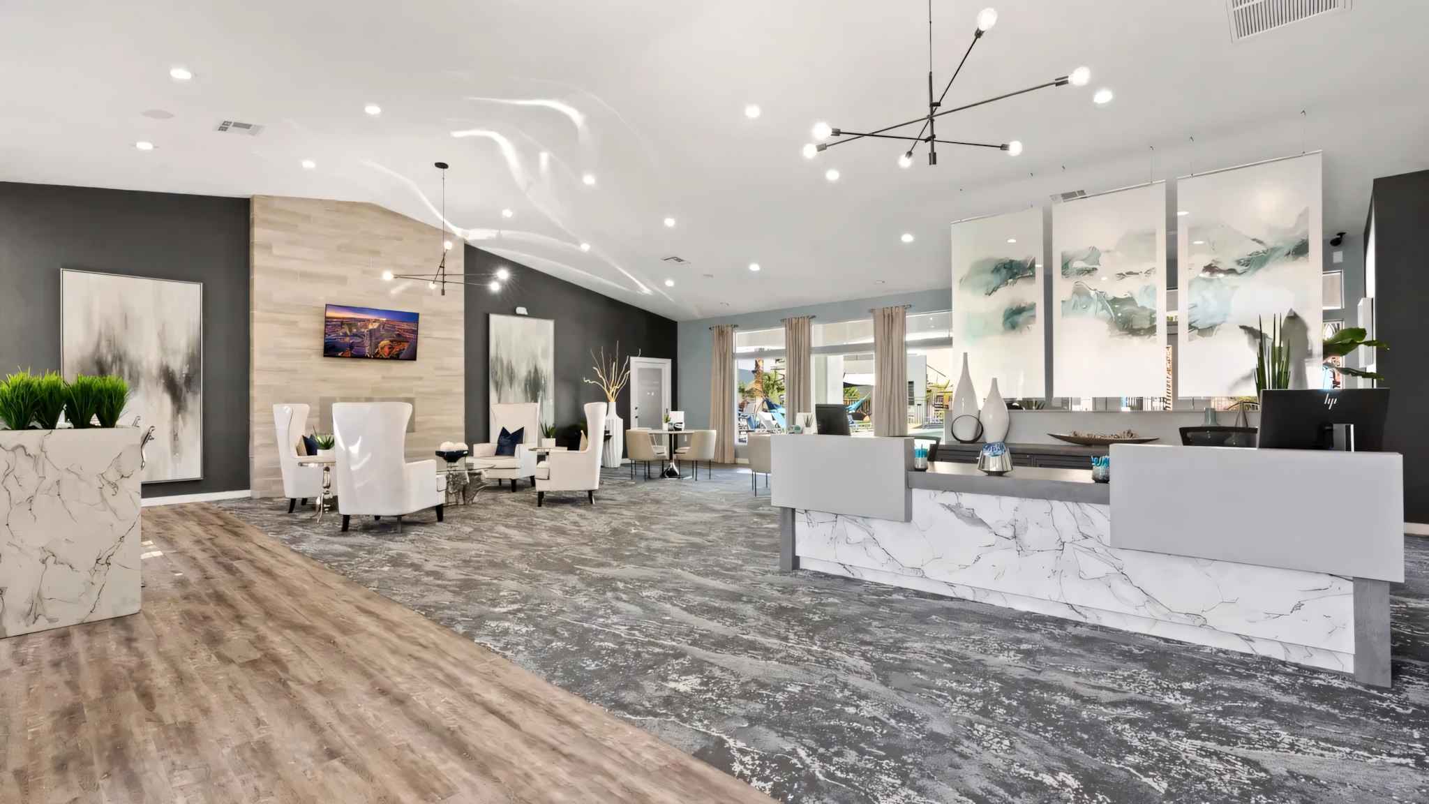 full view of leasing office with reception area and windows showing outside view at Millennium East