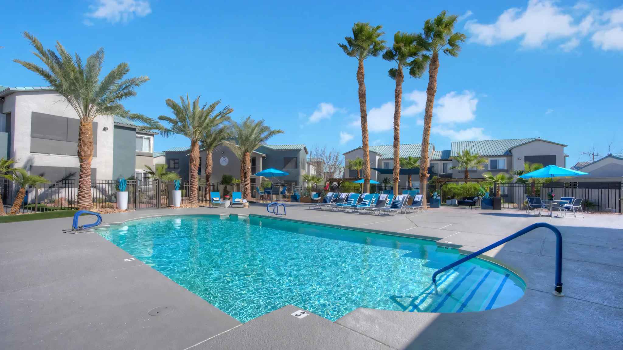 full view of pool and lounge chairs at Millennium East