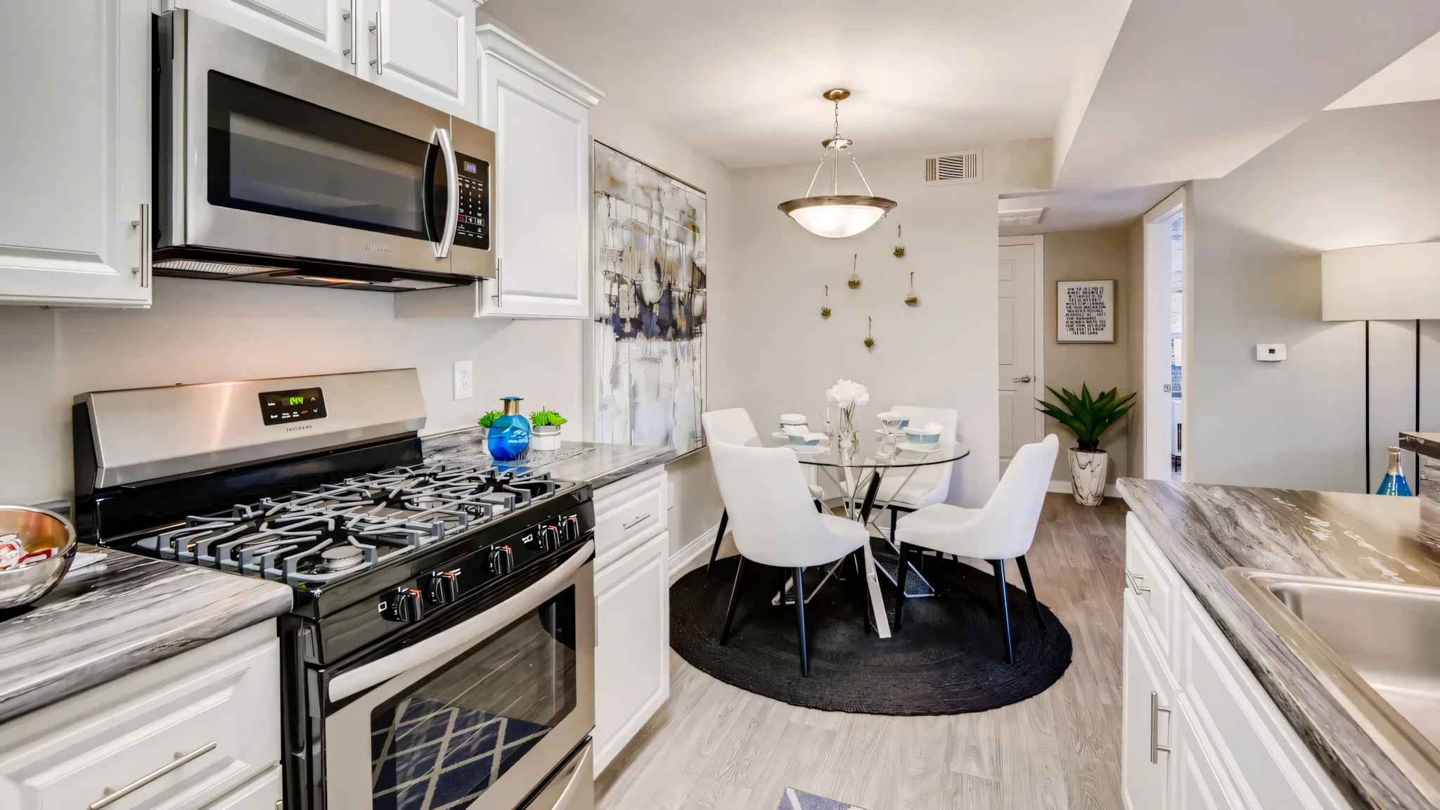 kitchen view of counter space with kitchen cabinets at Millennium East