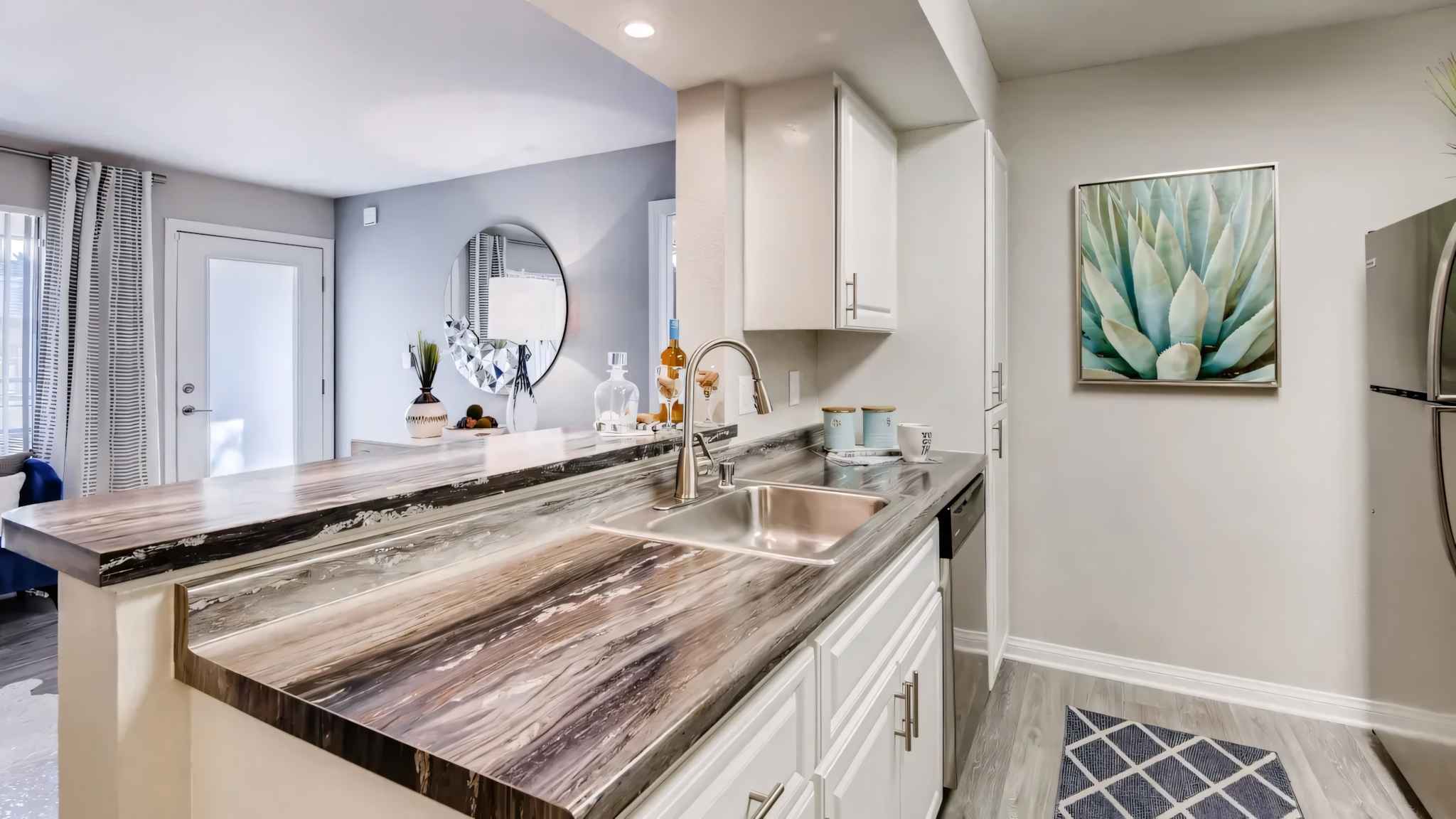 kitchen view showing bright sunlit room at Millennium East