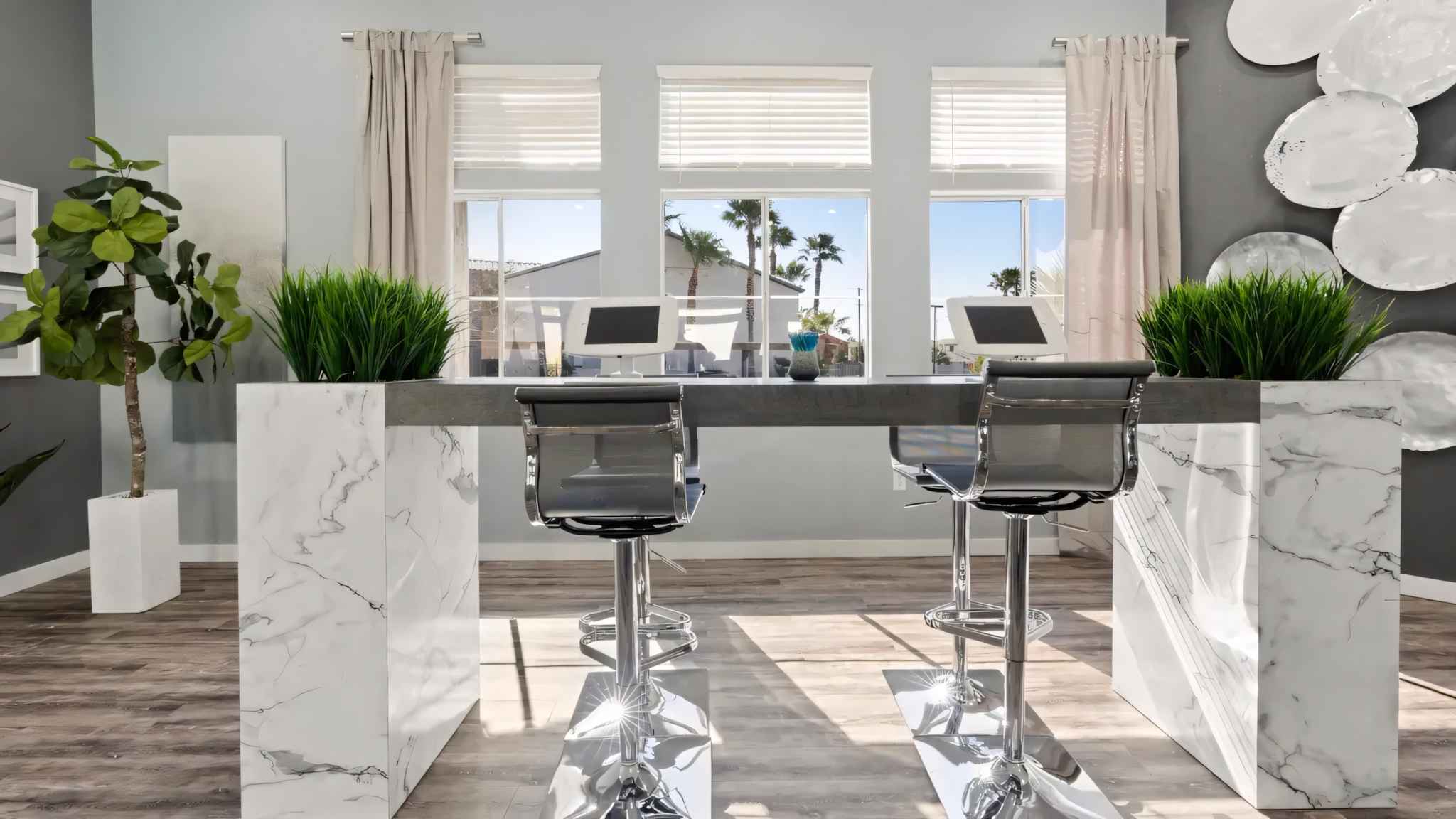 leasing office reception counter with tablets at Millennium East